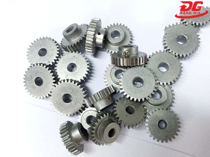 Nhông (bánh răng) máy ép